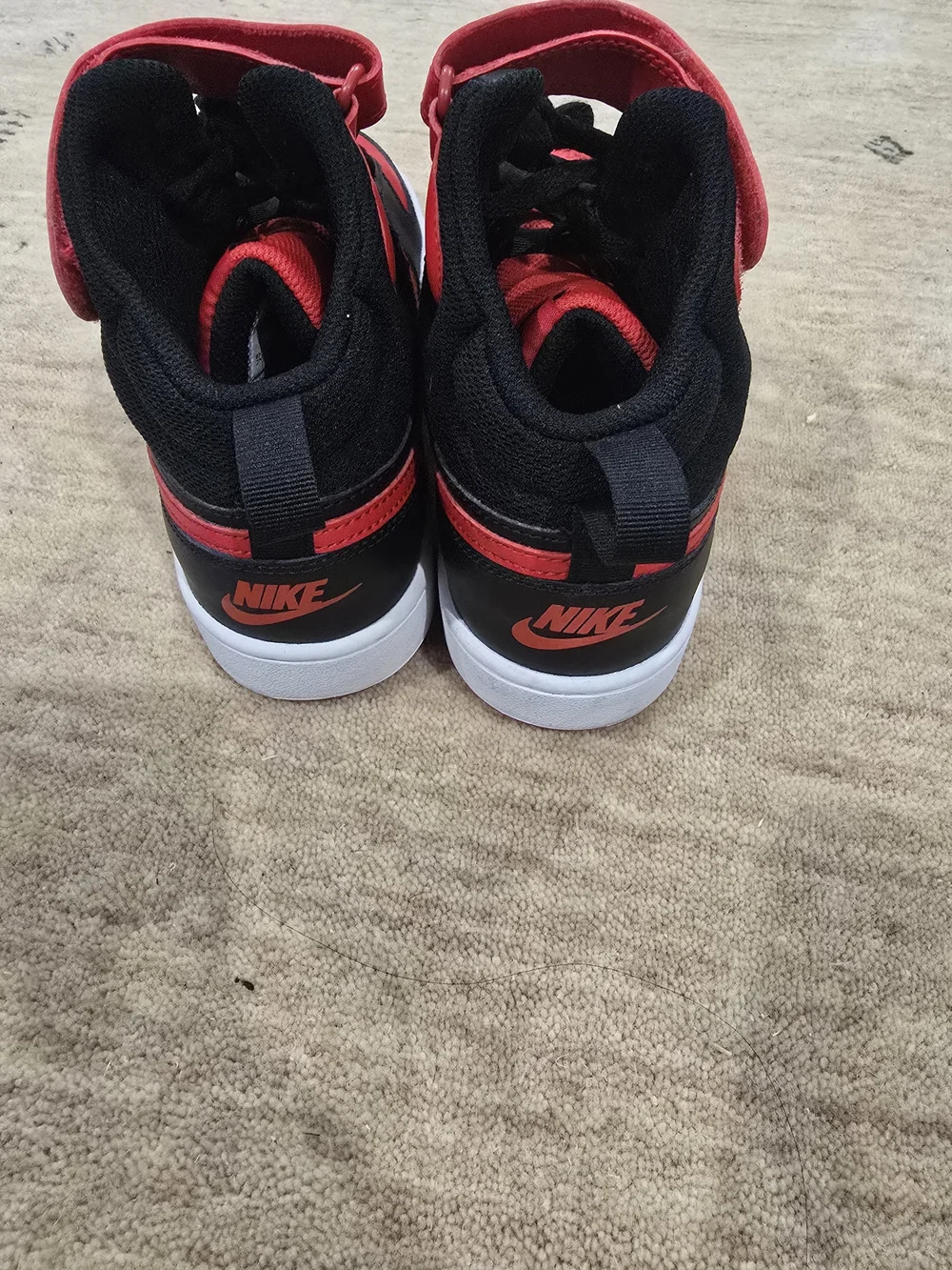 Nike High Top Sneakers in Black & Red
